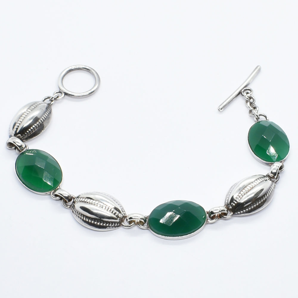 Elegant Sterling Silver Bracelet with Green Agate and Cowrie Shell Accents.