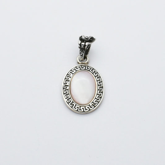 Sterling Silver Oval Pendant With Mother Of Pearl Stone And A Tiger Buckle On The Top.