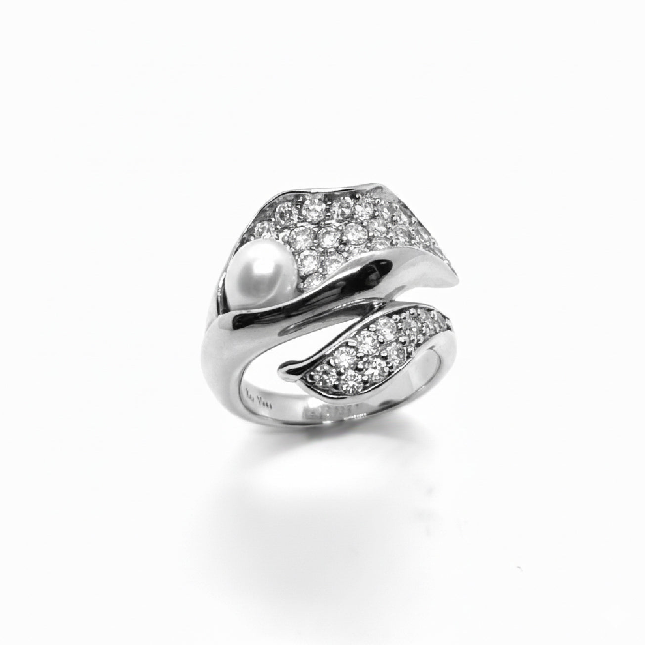 Sculptural sterling silver white rhodium plated wrap ring with pavé cubic zirconia and a single freshwater pearl.