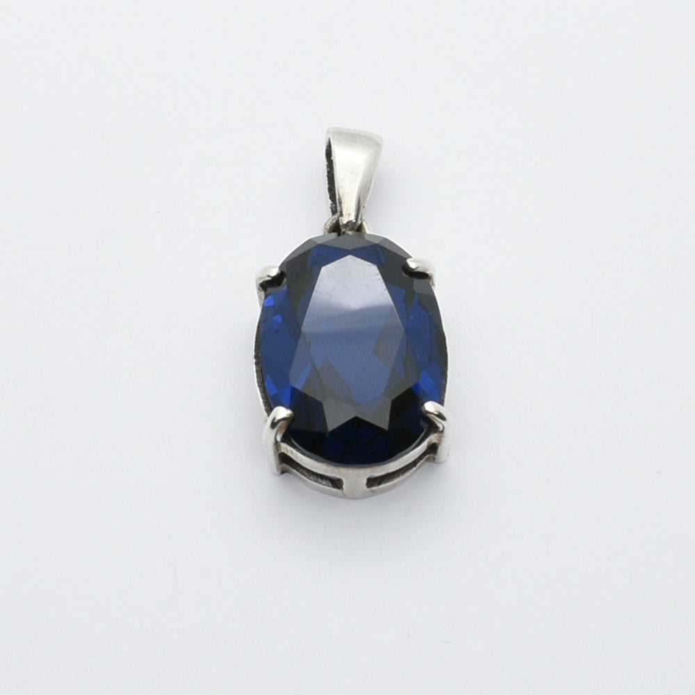 Oval Blue Faceted Stone Pendant in Sterling Silver-Tone Setting