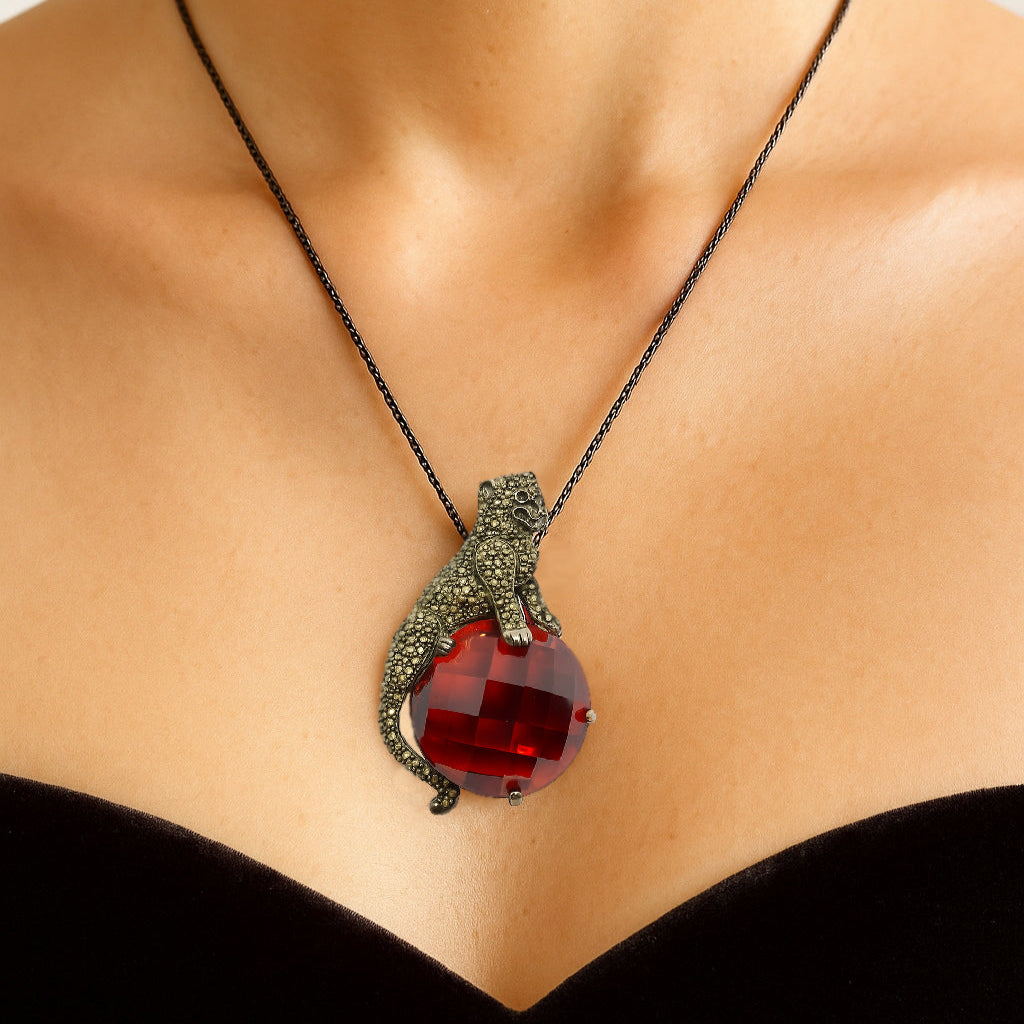 "Power and Passion": Garnet & Marcasite Panther Vintage Silver Pendant.